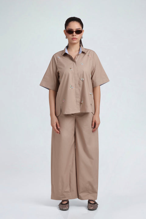 Clayflora sand-beige cotton co-ord set for women with pastel floral embroidery and wide-leg trousers, full-length front view