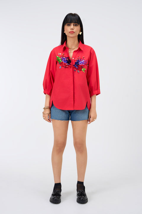 Firecracker red cotton shirt for women with balloon sleeves, full-length front view with denim shorts
