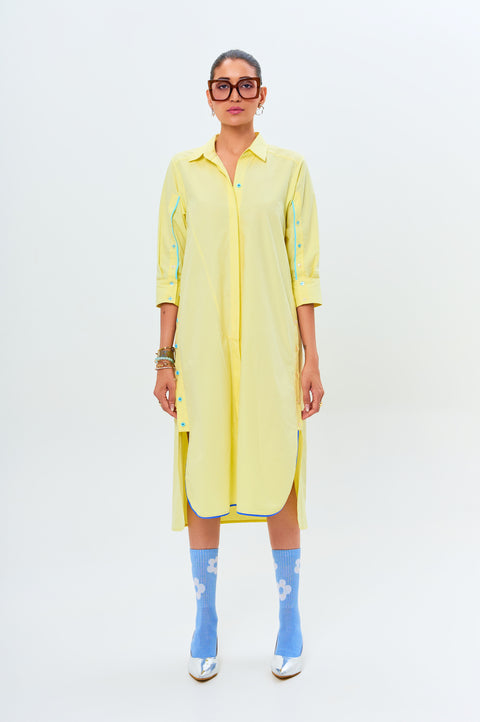 Lia pastel yellow shirt dress for women with side button detail and contrast piping, front view