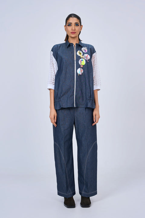 Notebook denim co-ord set for women with appliqué jacket, white lace sleeves and wide-leg pants, front view