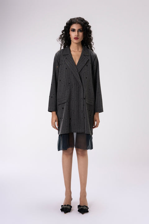 Noir charcoal pinstripe blazer dress for women with double-breasted lapels and sheer hemline, front view