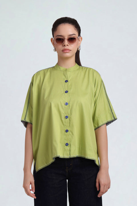Kiki lime-green cotton shirt for women with mandarin collar, deep-blue buttons and contrast stitching, front view