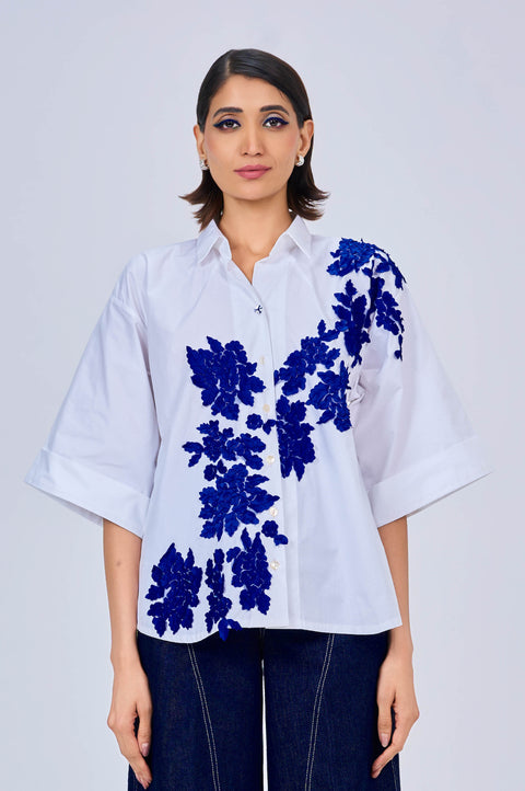 Blue Note white cotton shirt for women with blue floral appliqué, front view