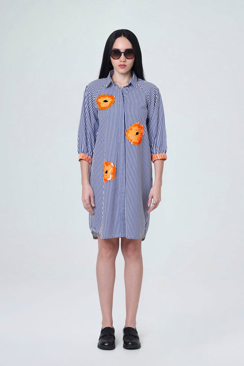 Petunia blue and white striped cotton shirt dress for women with orange sequin flowers and gathered sleeves, front view