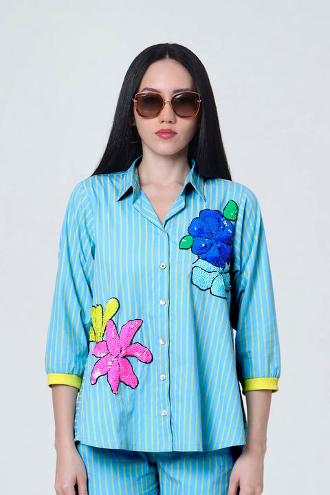 Sunday aqua blue cotton shirt for women with blue, pink and yellow sequin flower embroidery, front view